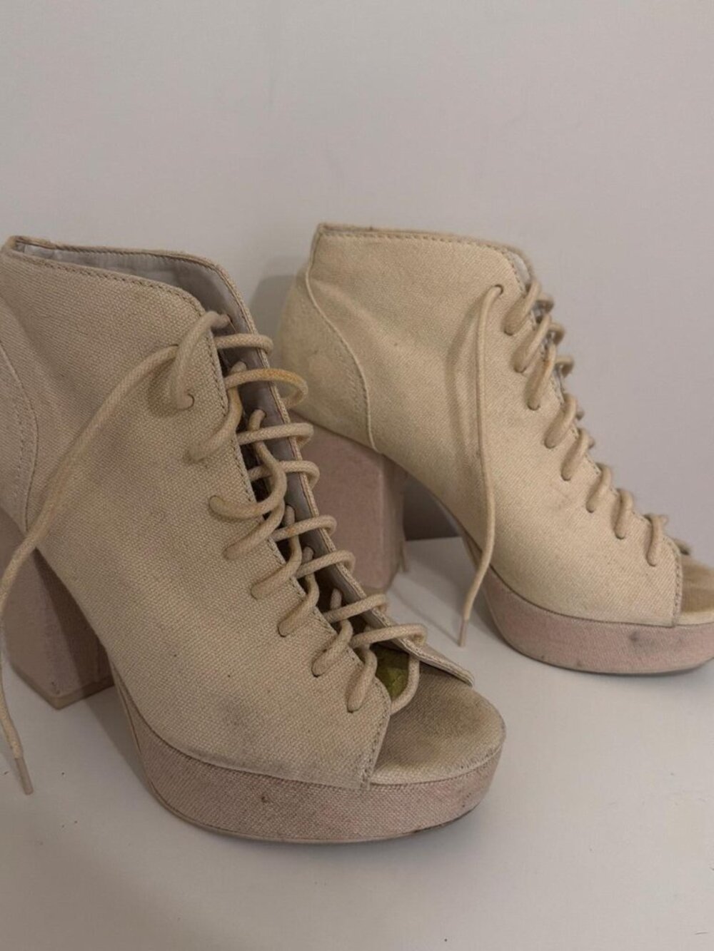 Cream platform lace up boots